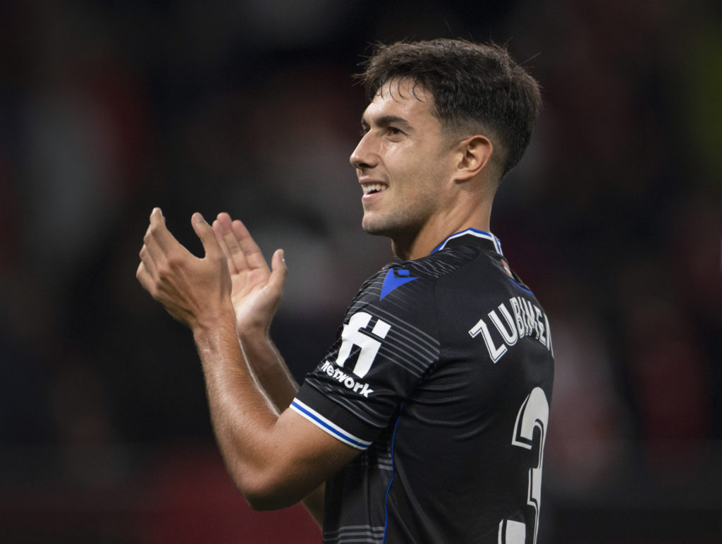 Martin Zubimendi applauds during a Real Sociedad match