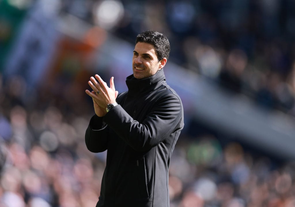 Mikel Arteta applauds during Tottenham vs Arsenal