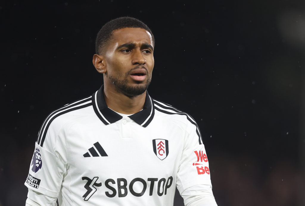 Reiss Nelson looks on during a Fulham match