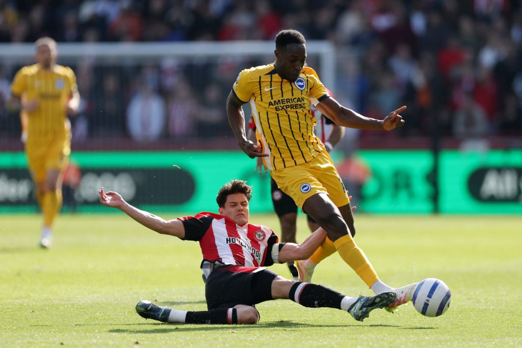 Christian Norgaard challenges Danny Welbeck during Brentford FC v Brighton & Hove Albion FC in the Premier League clash.