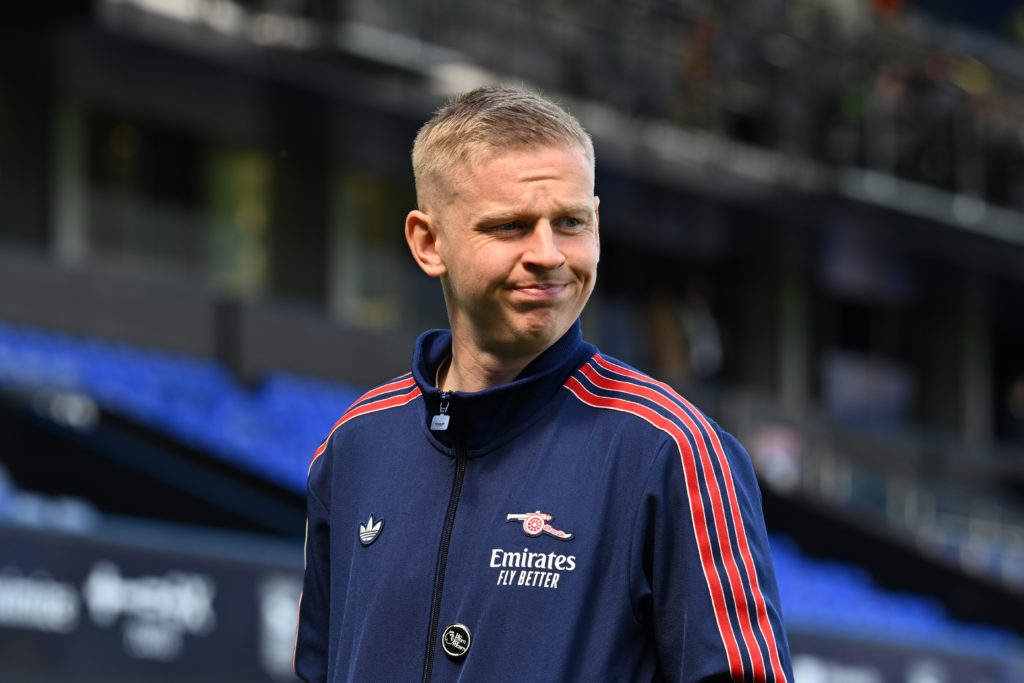Oleksandr Zinchenko looks on before an Arsenal match