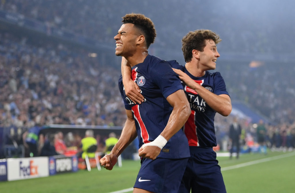 PSG players Desire Doue and Joao Neves celebrate in the Champions League final