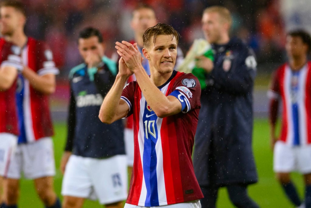 Martin Odegaard claps the Norway fans after his country beat Italy.