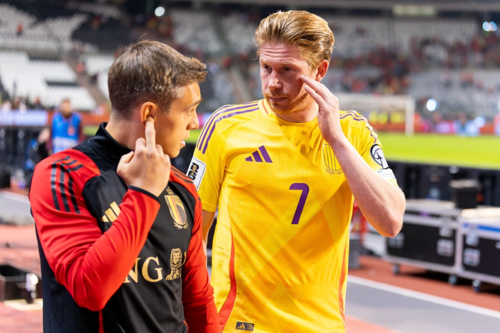 Leandro Trossard talks to Kevin De Bruyne after Belgium beat Wales 4-3.