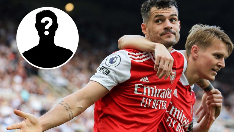 Arsenal's Swiss midfielder Granit Xhaka and Arsenal's Norwegian midfielder Martin Odegaard (R) celebrates their team's second goal during the Engli...