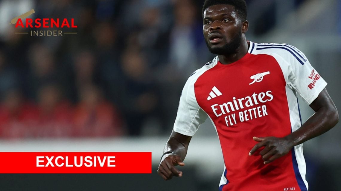 Thomas Partey looks on during Atalanta vs Arsenal next to an exclusive Arsenal Insider banner
