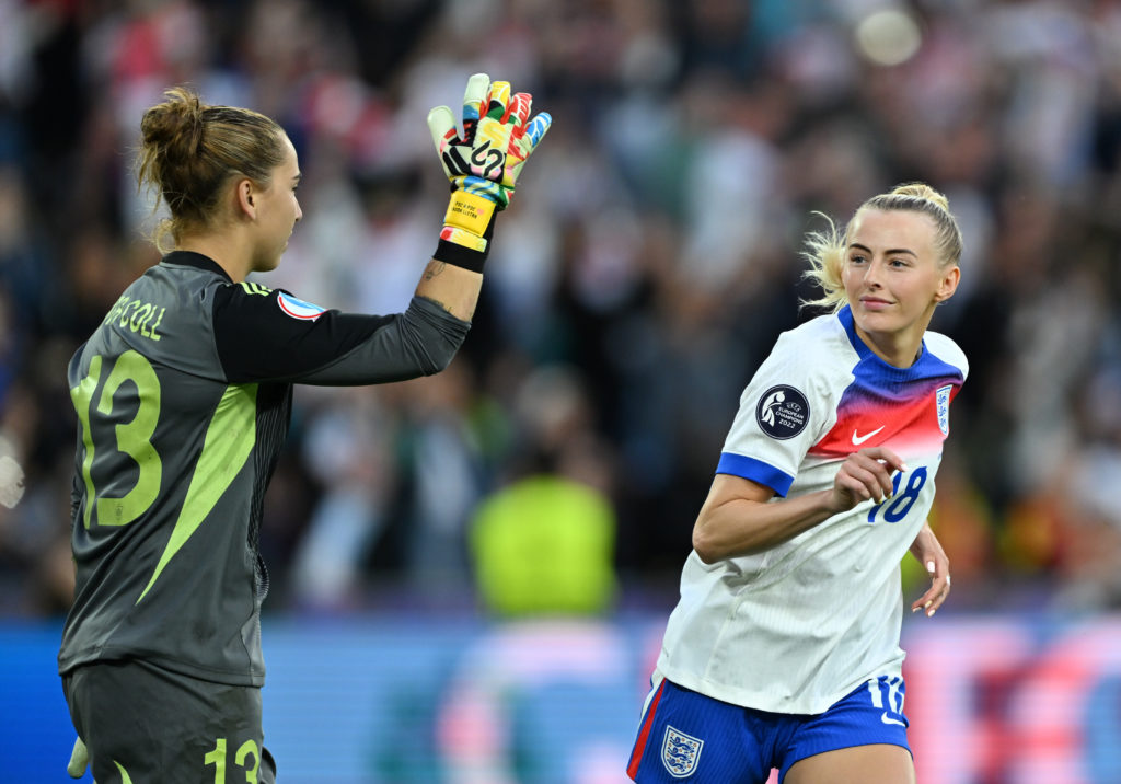 Chloe Kelly celebrates scoring the winning penalty for England in the Euros final.