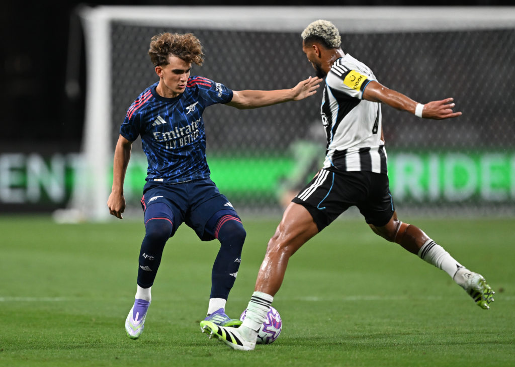 Max Dowman challenges for the ball with Joelinton during Arsenal vs Newcastle United