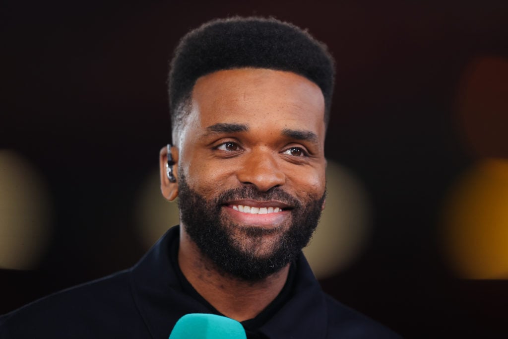 Darren Bent smiling while working as a pundit