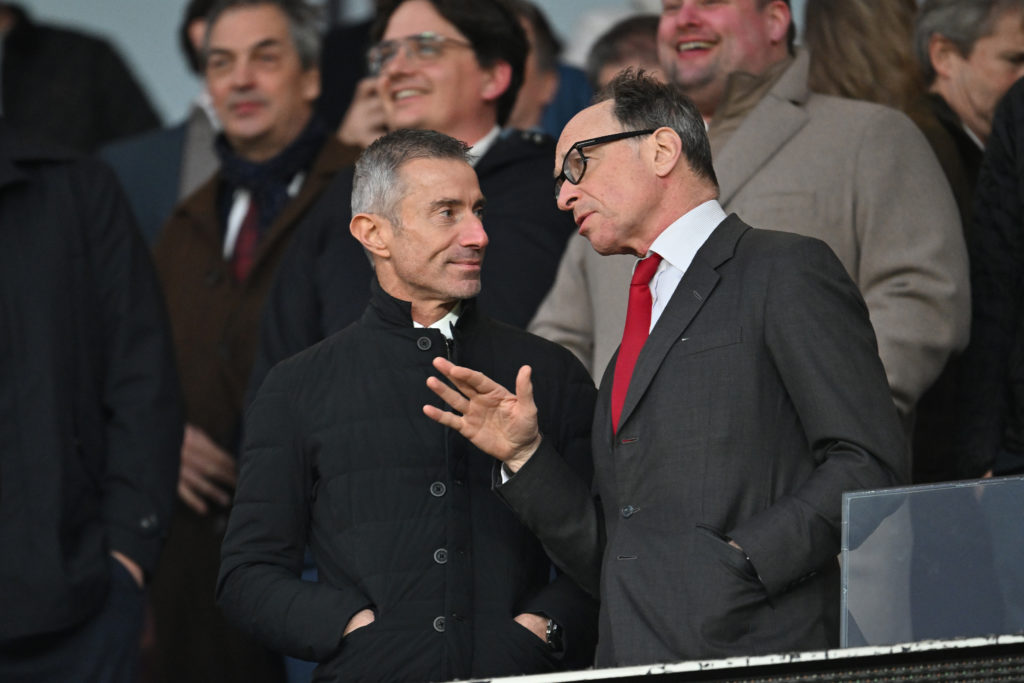 Andrea Berta, Sporting Director of Arsenal (L), speaks to Tim Lewis, Vice Chairman of Arsenal (R), in the stand prior to the Premier League match between Arsenal FC and Fulham FC at Emirates Stadium on April 01, 2025