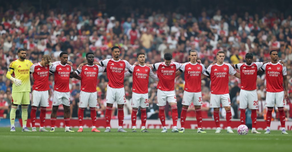 Arsenal players during a minutes silence ahead of kick off during the Premier League match between Arsenal and Leeds United at Emirates Stadium.