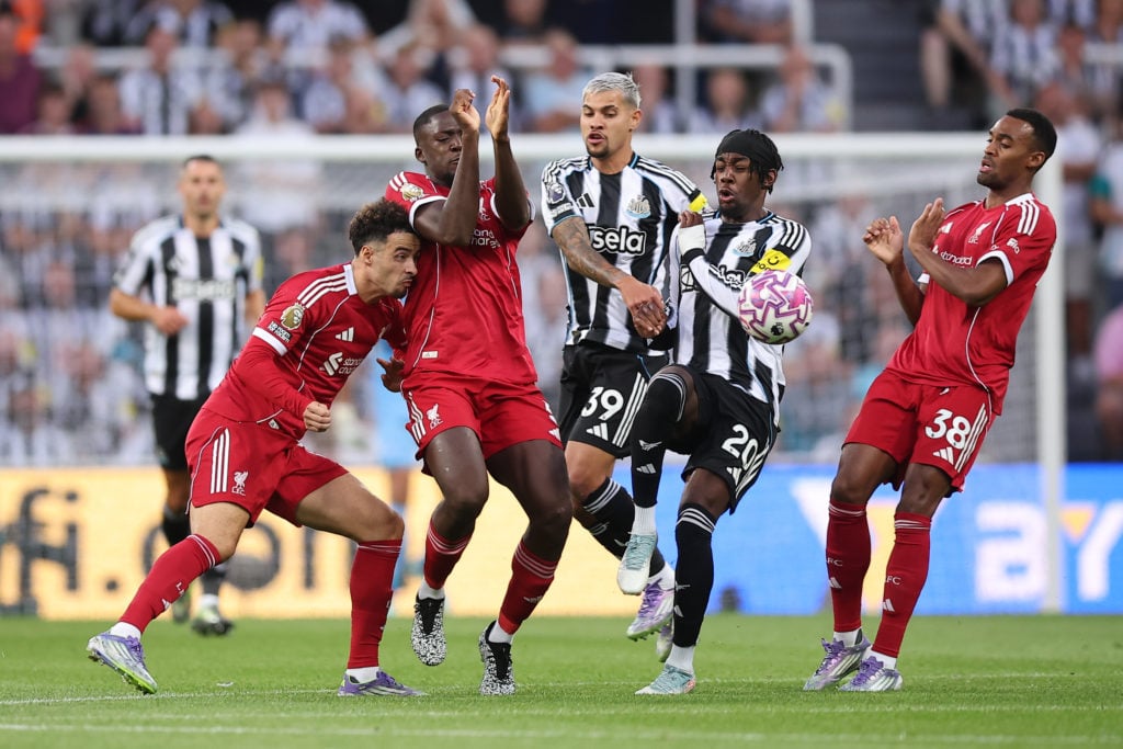 Curtis Jones of Liverpool, Ibrahima Konate of Liverpool, Bruno Guimaraes of Newcastle United, Anthony Elanga of Newcastle United and Ryan Gravenberch of Liverpool compete for the ball during the Premier League match between Newcastle United and Liverpool.
