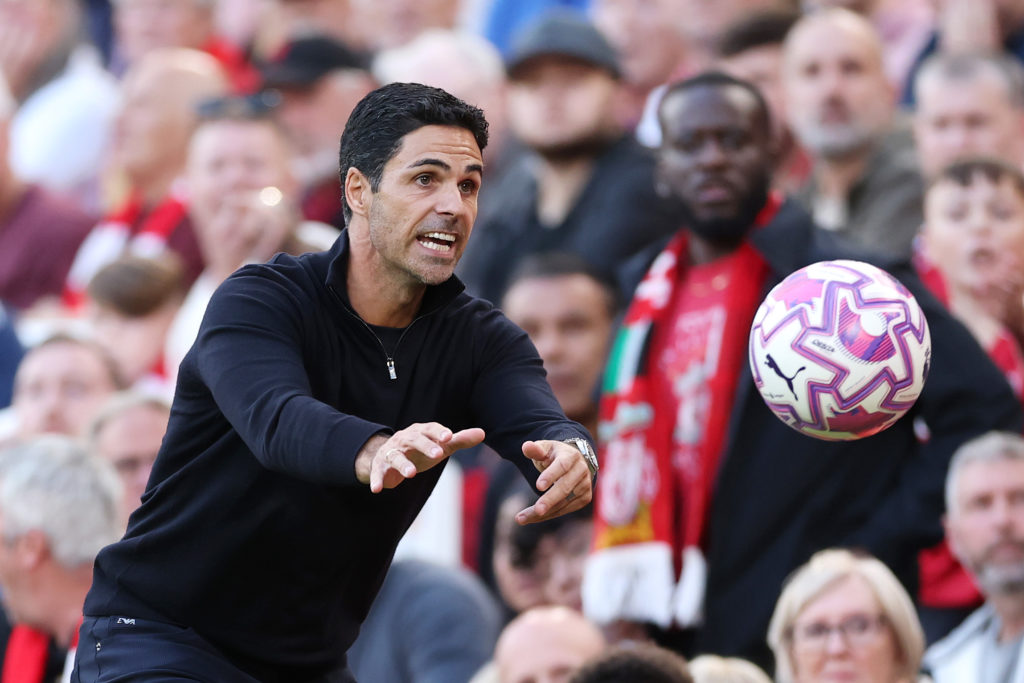Mikel Arteta throws the ball during Liverpool v Arsenal