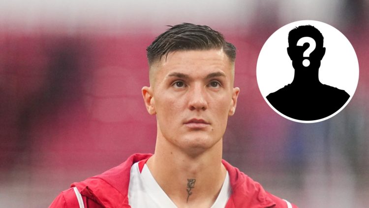 Benjamin Sesko of RB Leipzig looks on during the 1. Bundesliga match between RB Leipzig and VfB Stuttgart at Red Bull Arena, with mystery player in...