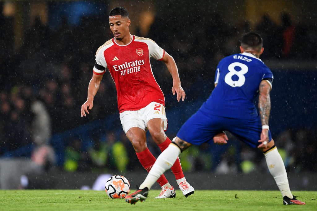 William Saliba dribbles past Enzo Fernandez during Arsenal vs Chelsea