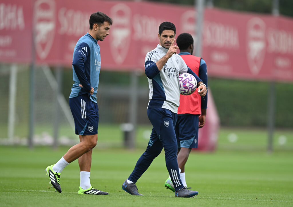 Mikel Arteta and Martin Zubimendi speaking during an Arsenal Training Session