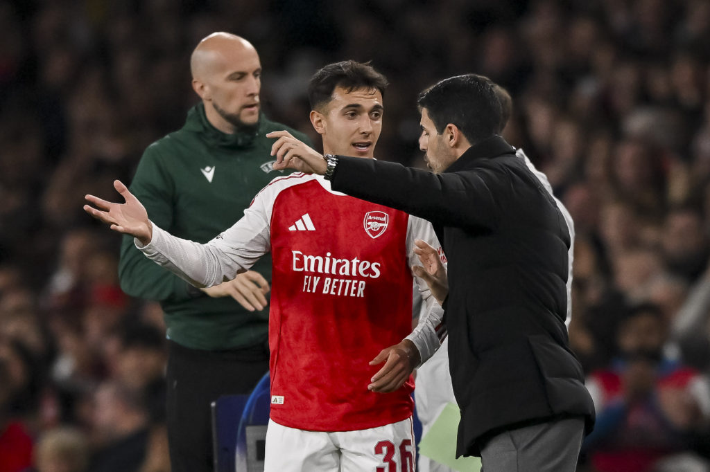 Martin Zubimendi of Arsenal talks to head coach Mikel Arteta of Arsenal during the UEFA Champions League 2025/26 League Phase MD2 match between Arsenal FC and Olympiacos FC
