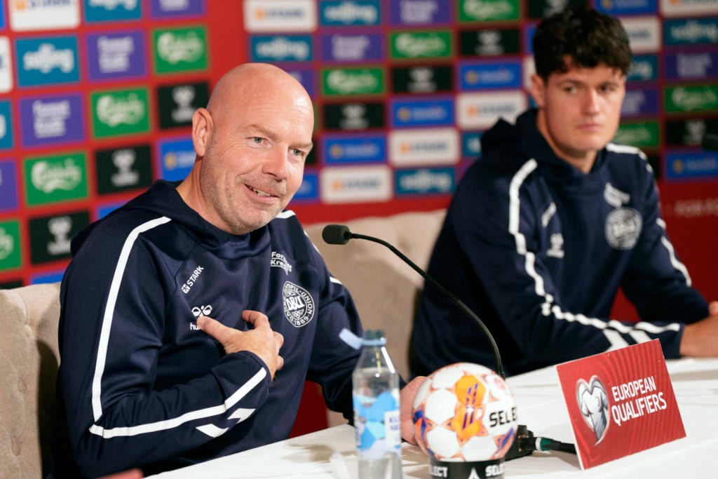 Denmark's head coach Brian Riemer (L) and Denmark's midfielder Christian Norgaard address a press conferrence in Helsingor on October 11, 2025, the eve of their FIFA World Cup 2026 Group C European qualification football match against Greece.