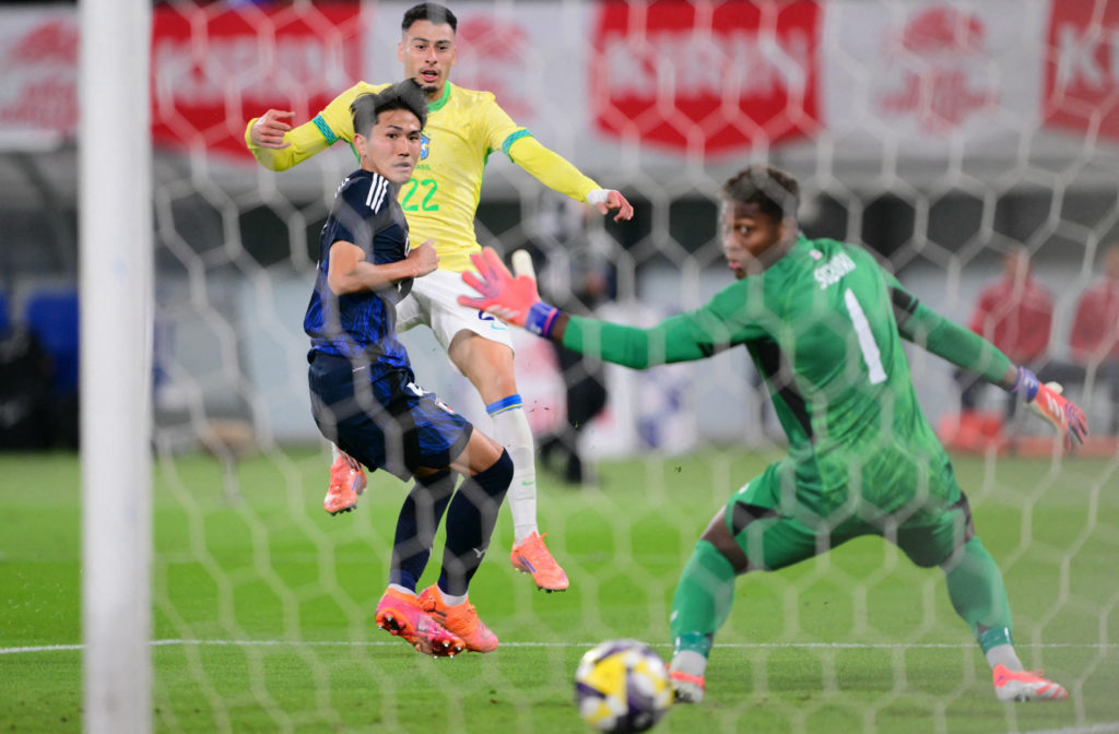 Brazil's forward Gabriel Martinelli (2nd L) scores a goal during the international football friendly match between Japan and Brazil at the Tokyo stadium in Chofu, Tokyo.