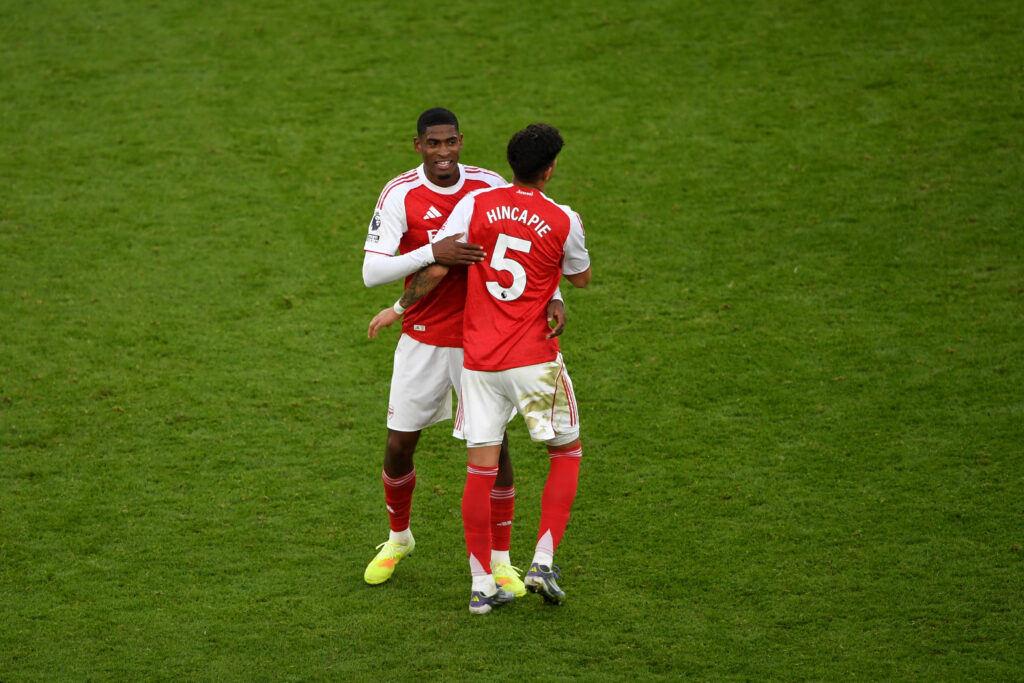 Cristhian Mosquera greets teammate Piero Hincapie of Arsenal celebrates following the Premier League match between Arsenal and Crystal Palace at Emirates Stadium.