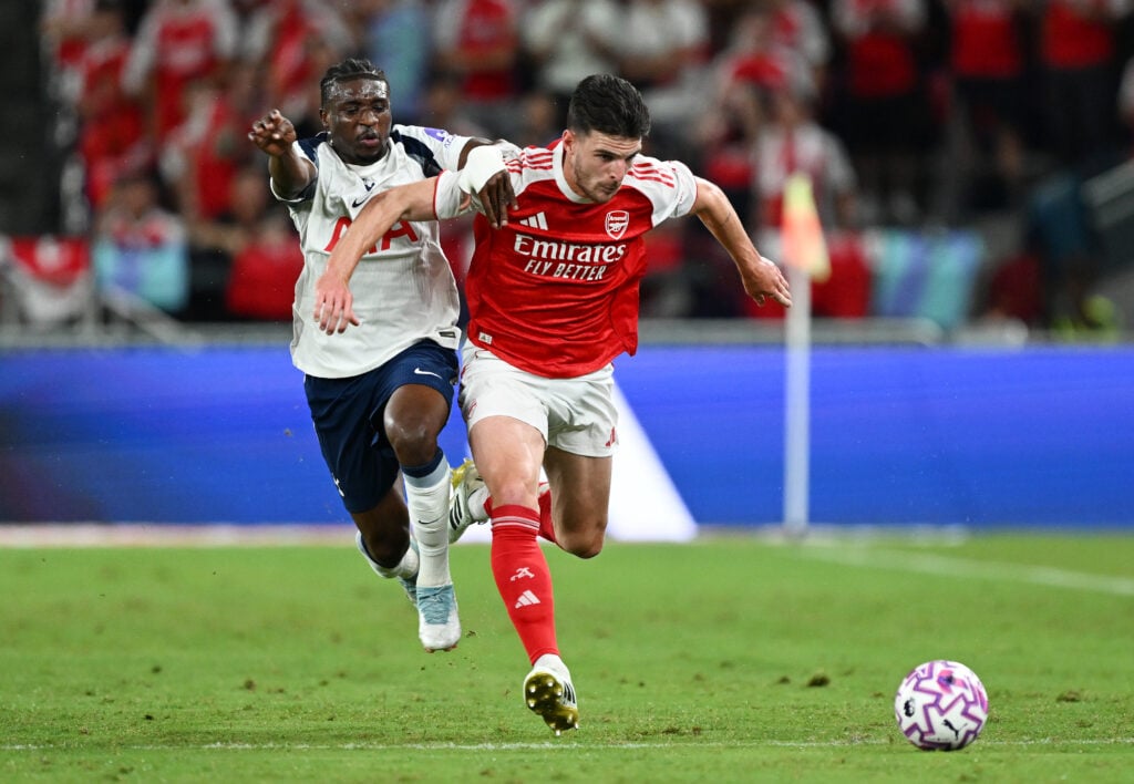 Mohammed Kudus and Declan Rice tussle for the ball during Arsenal vs Tottenham.