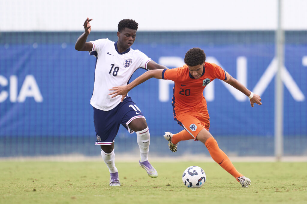 Demiane Agustien battles for the ball in the Netherlands under-19s match with England