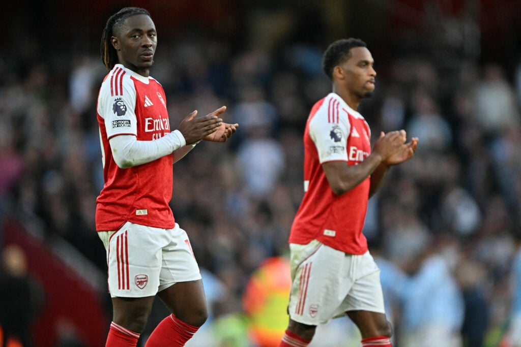 Eberechi Eze and Jurrien Timber applaud the fans after an Arsenal game