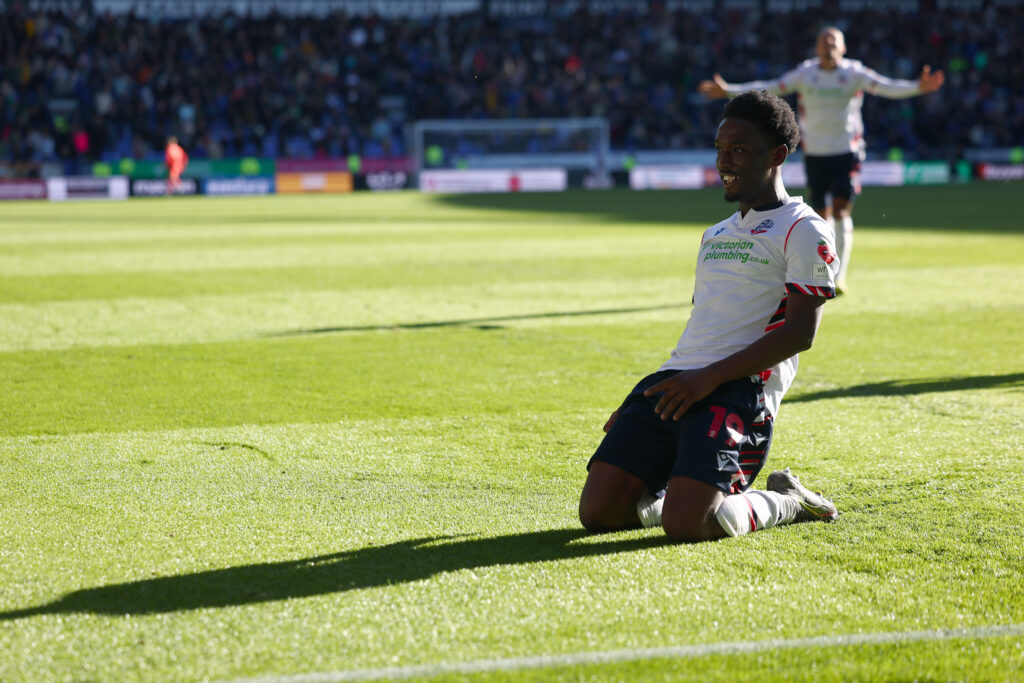 Amario Cozier-Duberry celebrates scoring for Bolton against Cardiff