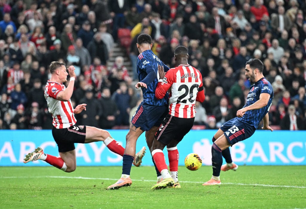 Dan Ballard blocks a shot from Mikel Merino in Sunderland vs Arsenal
