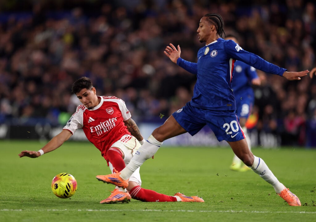 Piero Hincapie of Arsenal battles for possession with Joao Pedro of Chelsea during the Premier League.