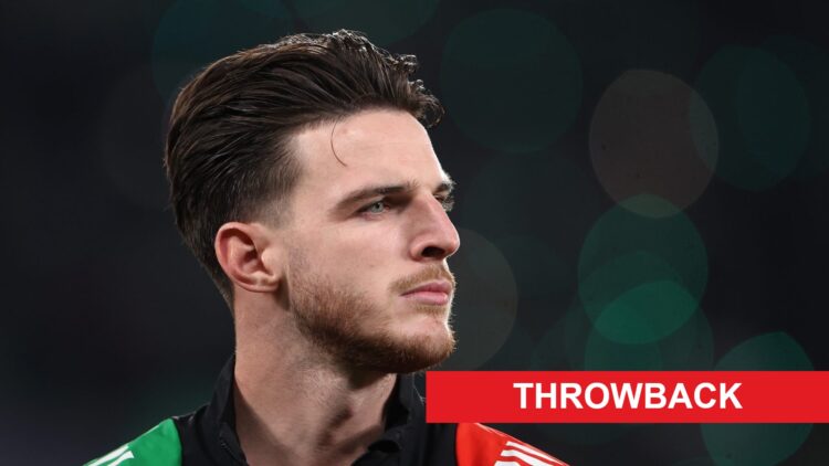 Image of Declan Rice looking on before an Arsenal game, overlaid a Throwback banner