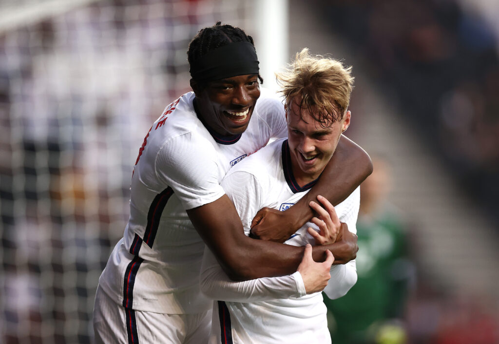 Cole Palmer of England celebrates with Noni Madueke of England after scoring his teams second goal during the UEFA Under 21 Qualifier