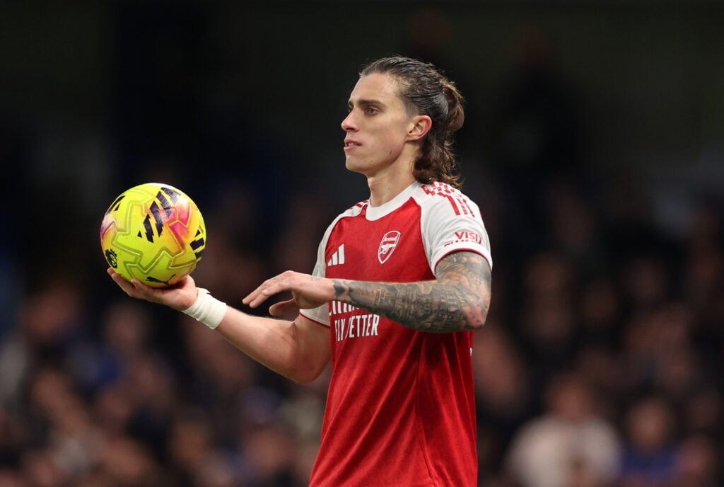 Riccardo Calafiori prepares to take a throw-in during an Arsenal game
