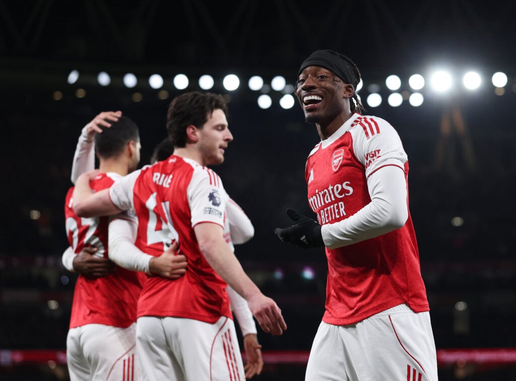Noni Madueke of Arsenal celebrates after teammate Mikel Merino (not pictured) scores his team's first goal during the Premier League match between Arsenal and Brentford.