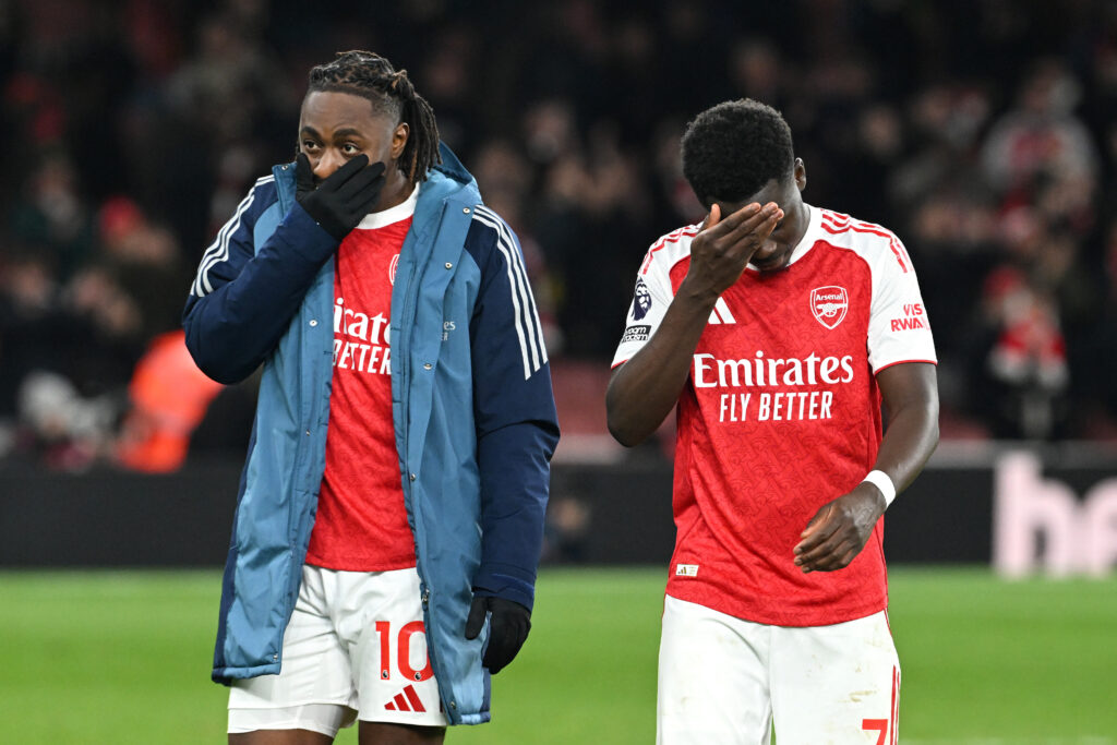 Eberechi Eze (L) and Bukayo Saka of Arsenal, look on following the team's victory in the Premier League match between Arsenal and Wolverhampton Wanderers at Emirates Stadium.