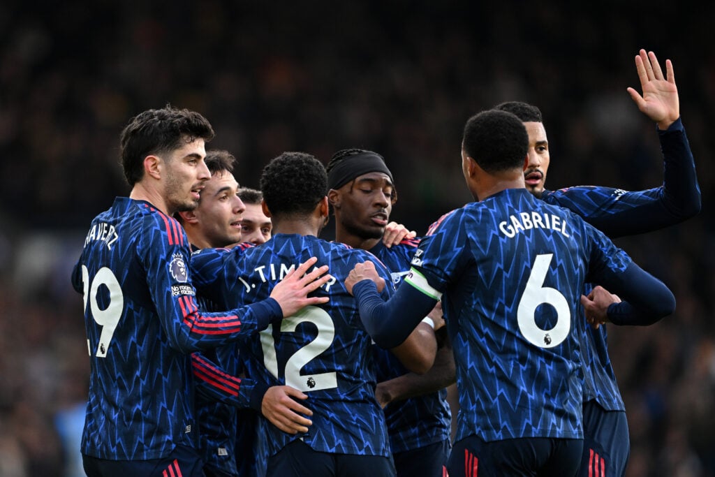 Arsenal players celebrate a goal vs Leeds United