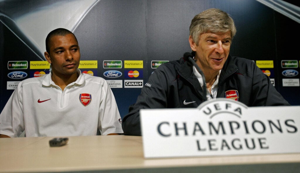 Arsenal's Gilberto (L) and manager Arsene Wenger during a press conference