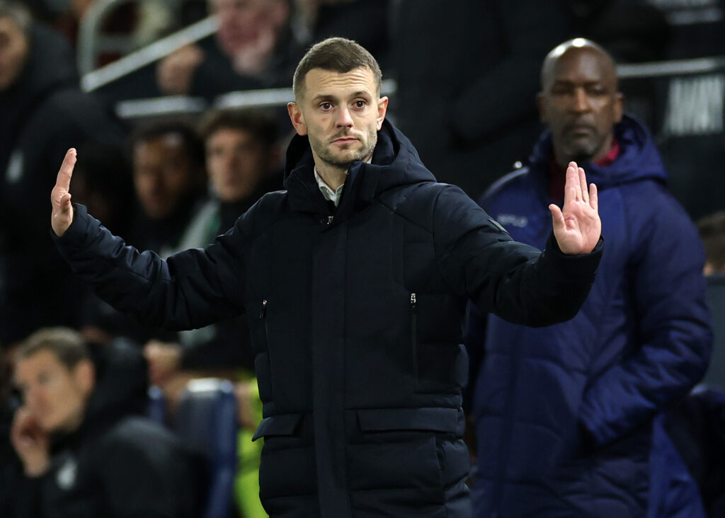 Jack Wilshere reacts on the touchline during a Luton Town game