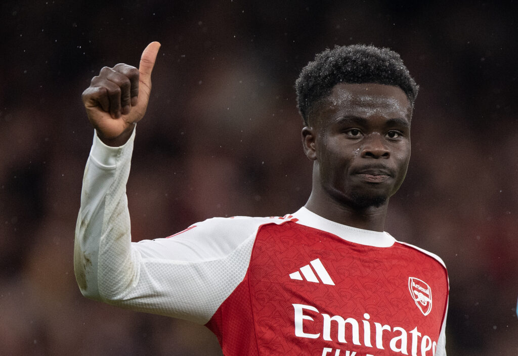 Bukayo Saka gives a thumbs-up during an Arsenal game