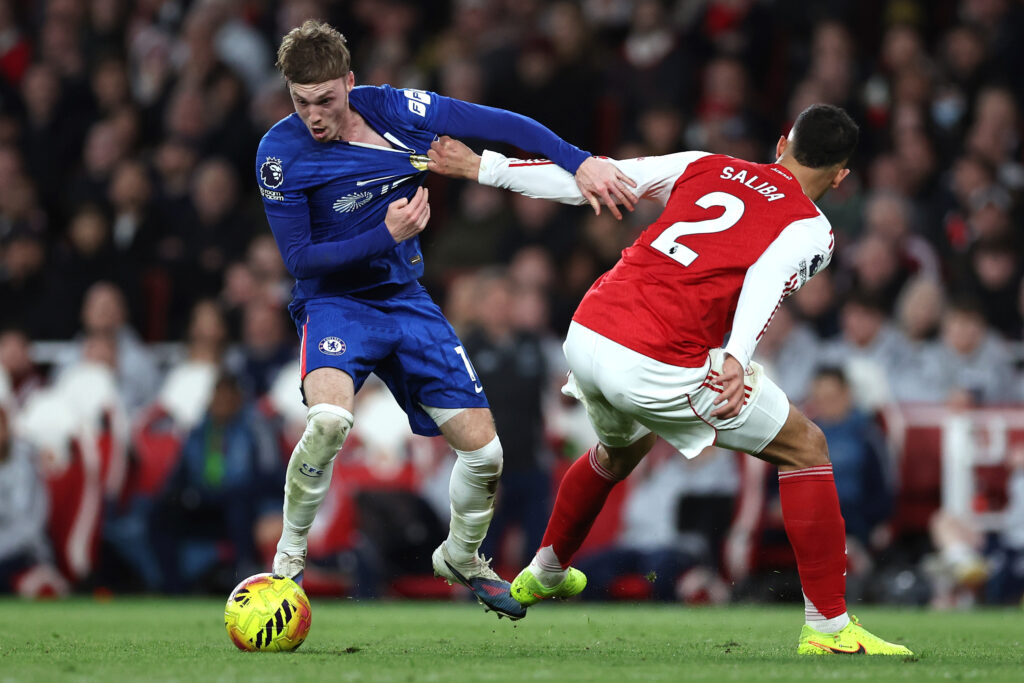 William Saliba pulls Cole Palmer back as he tries to get away with the ball during Arsenal vs Chelsea