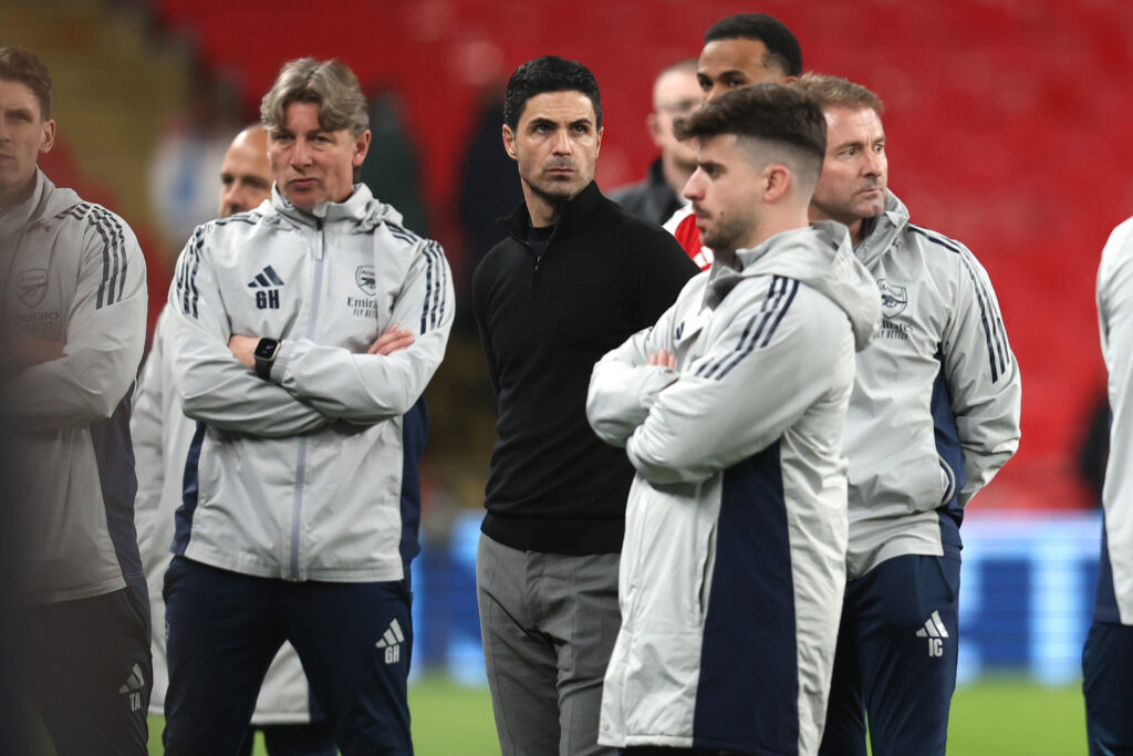 Mikel Arteta and his coaching staff look on after the Carabao Cup final against Manchester City