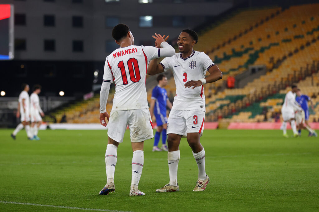 Ethan Nwaneri and Myles Lewis-Skelly shake hands after combining for a goal for the England U21s