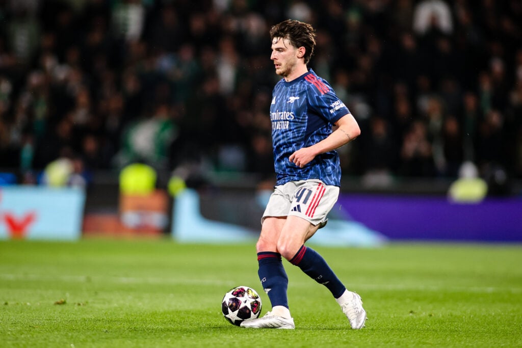 Declan Rice runs with the ball during an Arsenal game
