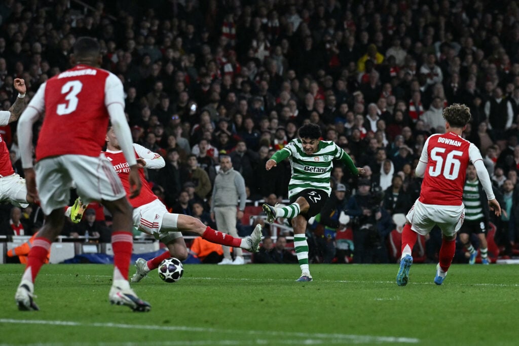 Joao Simoes shoots the ball as Arsenal players close him down to block the strike during a Sporting CP game