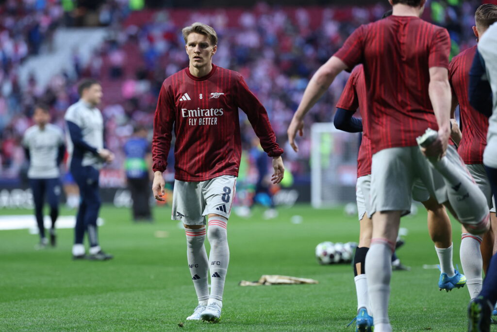 Arsenal's Martin Odegaard warming up before the game against Atletico Madrid