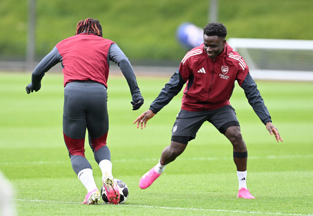 Eberechi Eze tries to dribble past Bukayo Saka during an Arsenal FC Training Session