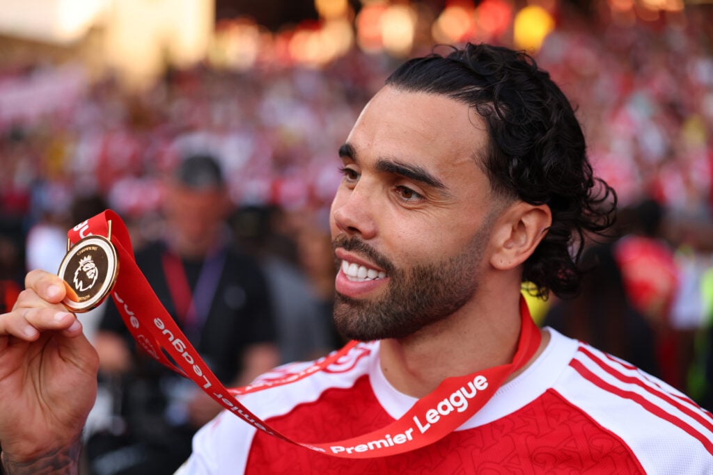 David Raya of Arsenal celebrates with the winners medal after the Premier League match between Crystal Palace and Arsenal at Selhurst Park.