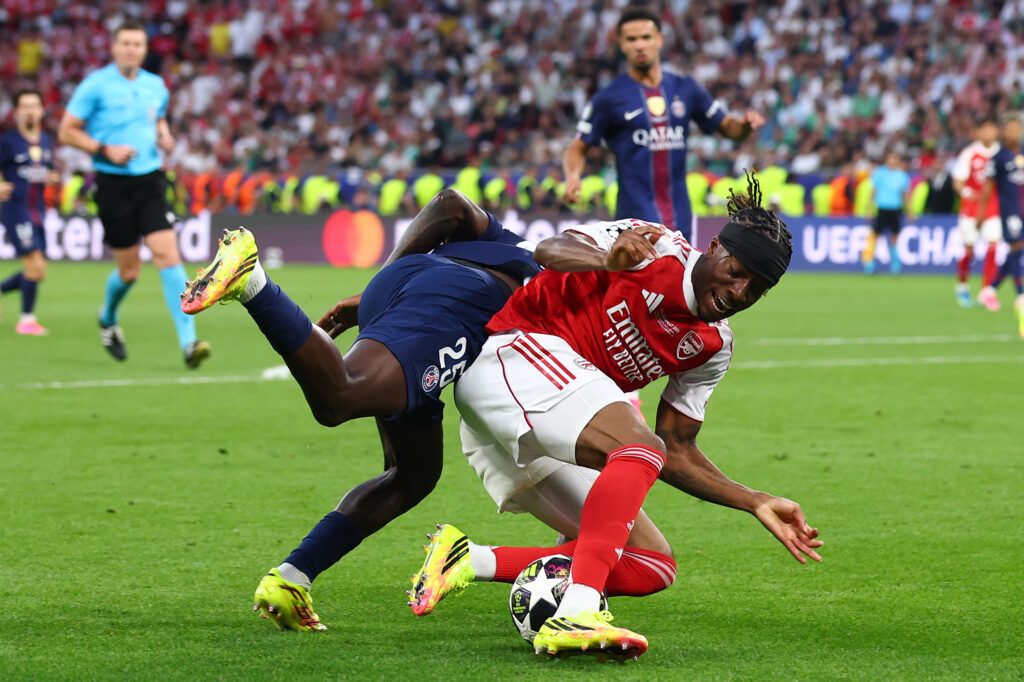 Noni Madueke and Nuno Mendes involved in an incident inside the box during Arsenal vs PSG