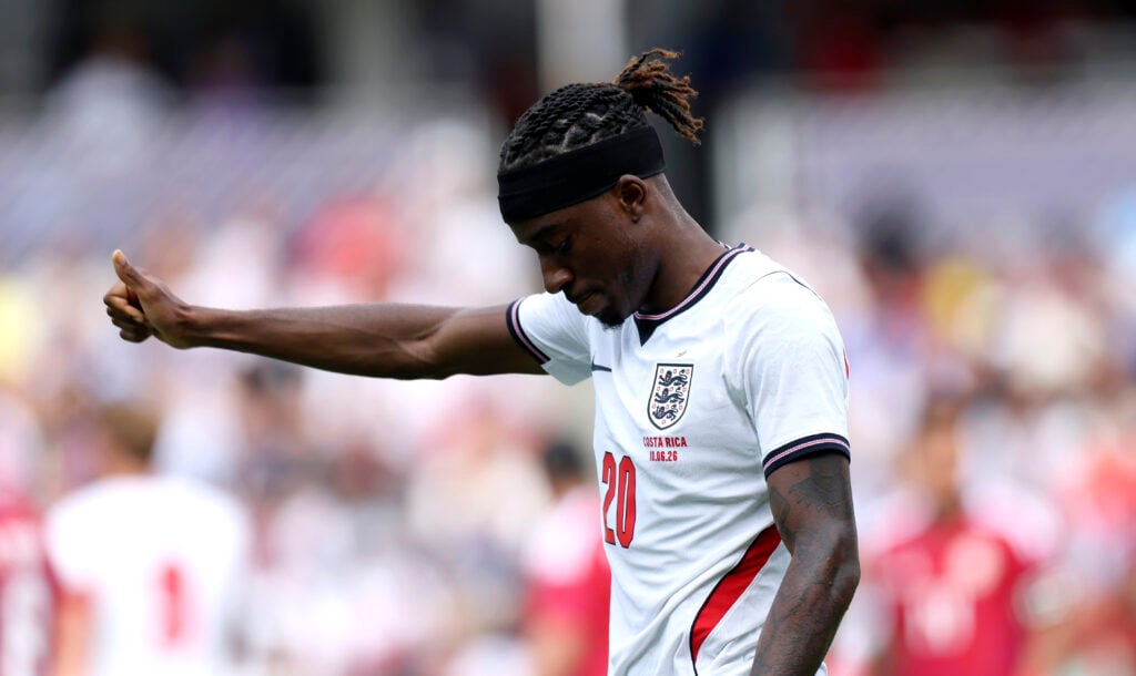 Noni Madueke reacts during an England game